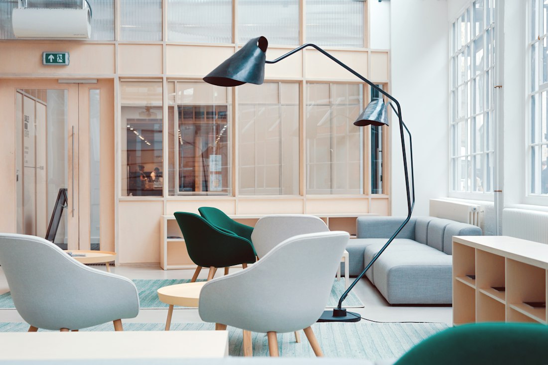 Bright creative studio workspace with design materials